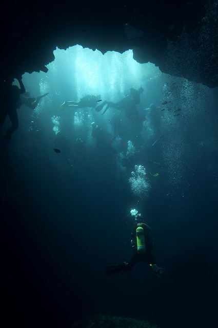 man dives underwater